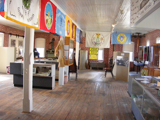 Photo of tribal flags hanging in the museum.